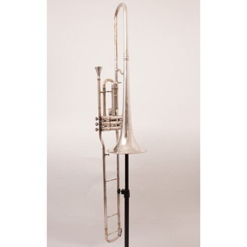 A B&M CHAMPION BRASS TRUMPET With two mouthpieces, in hard carry case.  (case 55cm x 18cm x 12cm)